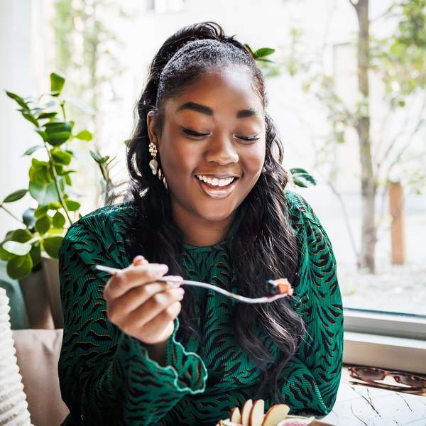 Black-woman-eating-fruit