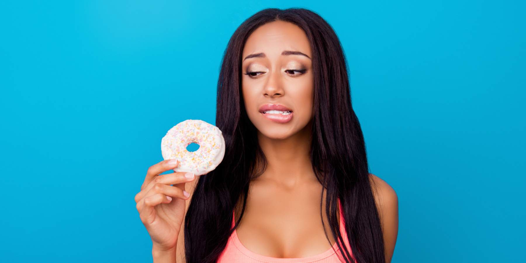 black-woman-eating-sugar-donut