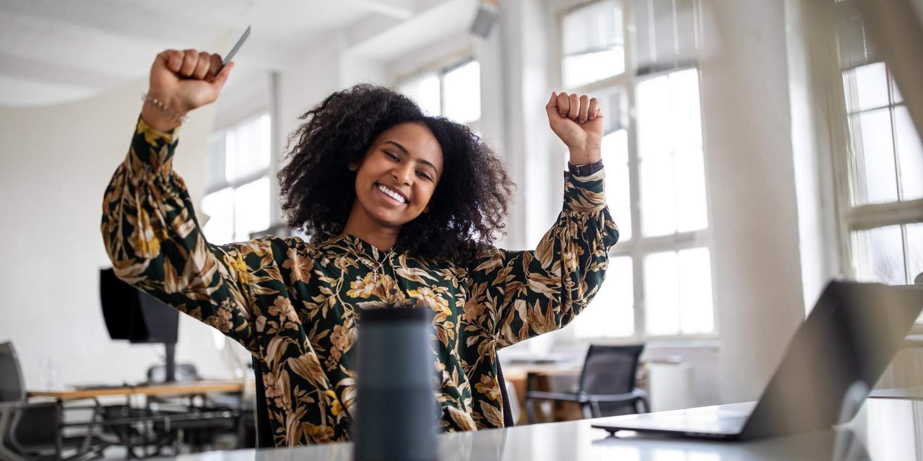 black-woman-excited-online-shopping-experience