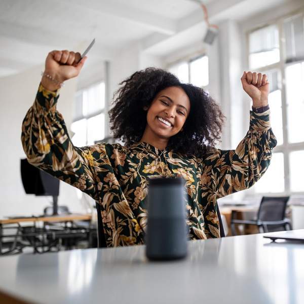 black-woman-excited-online-shopping-experience