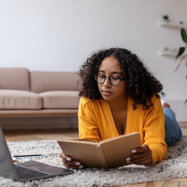 Black woman reflective journaling