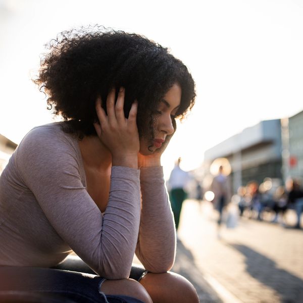 black-woman-sad-looking-defeated-feeling-stuck-liminal-spaces