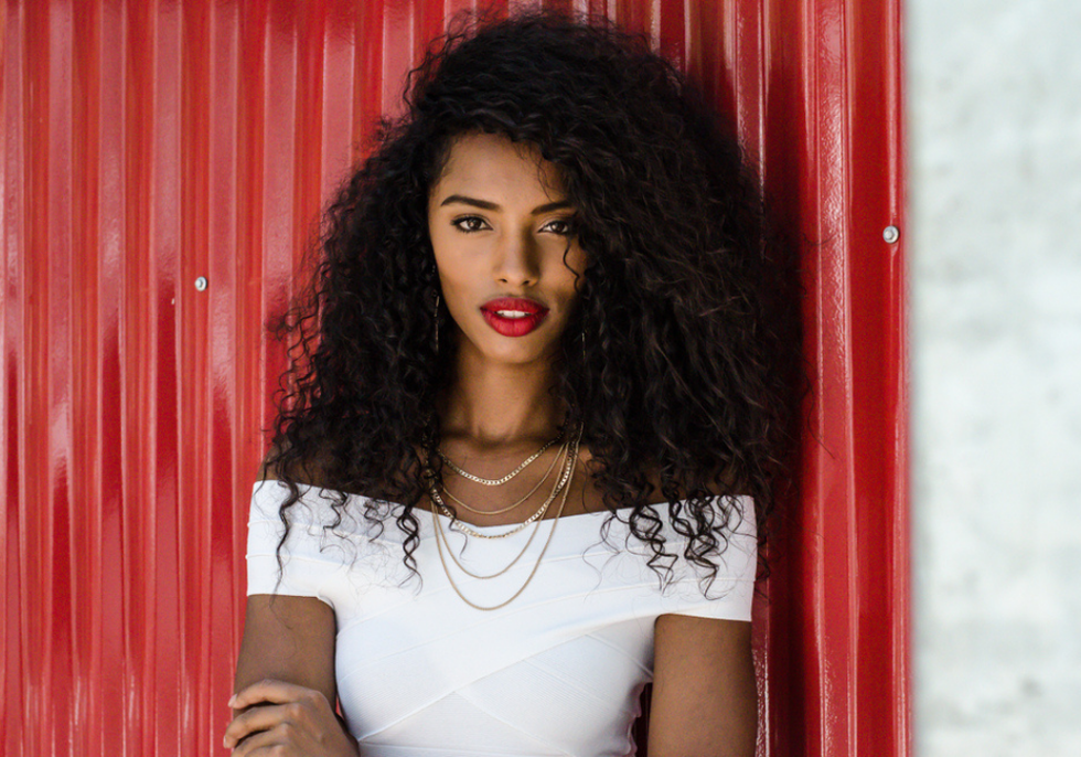 Black woman white shirt