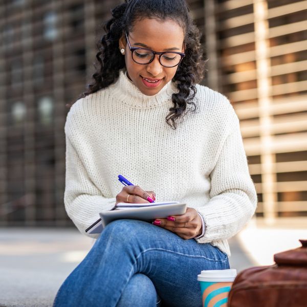Black woman writing