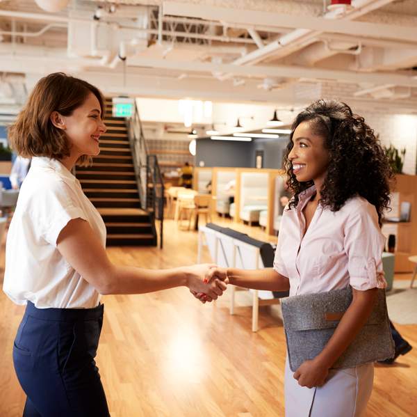 Business professional in formal attire, ready to impress in an interview setting