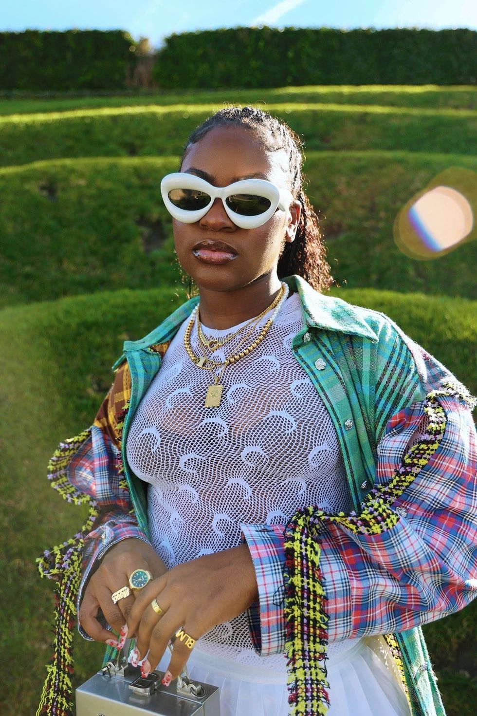 Dallas in a colorful and bold patterned summer outfit look