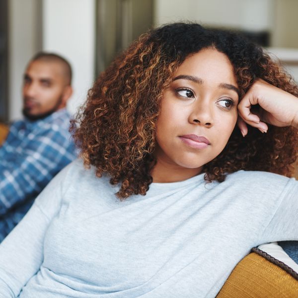Frustrated couple, ignore and fight with argument on sofa for disagreement, conflict or living room dispute at home. Upset woman, man or separation with affair for breakup or toxic relationship