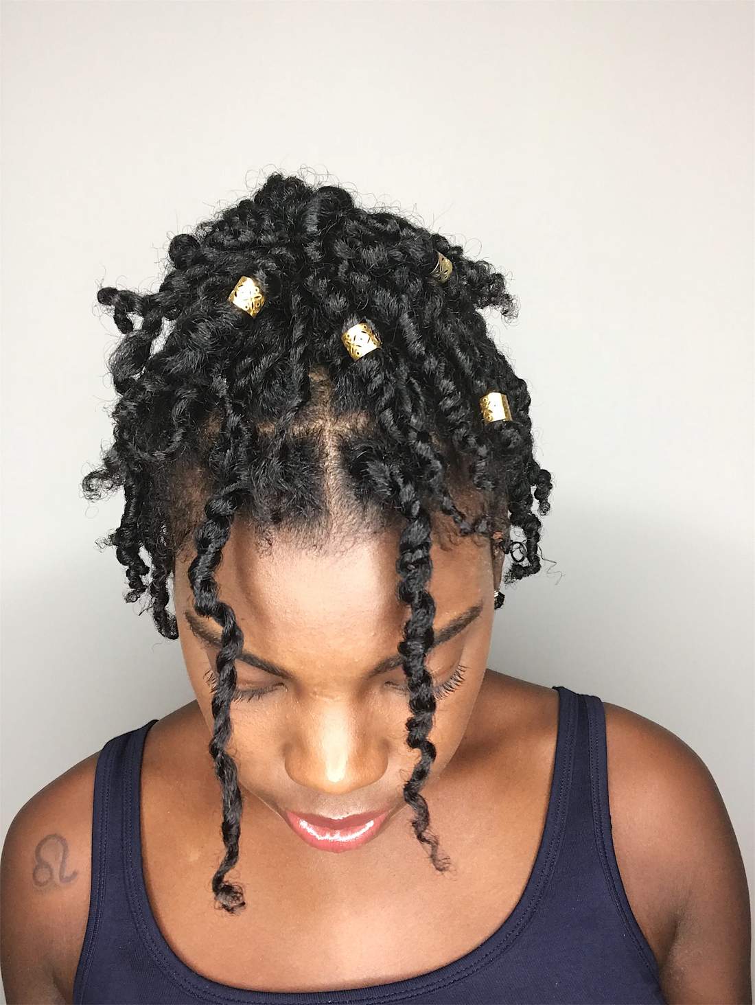 Mini Twists with Gold Accessories hairstyle photo
