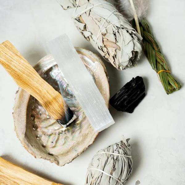 The Hella Lit Benefits Of Adding Palo Santo To Your Wellness Practice