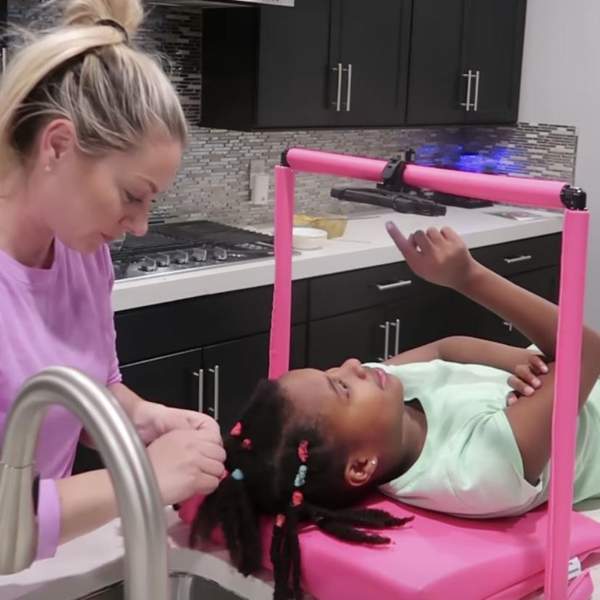 This Woman Learned How To Properly Take Care Of Her Adoptive Daughter's 4C Hair, And That's All We Ask