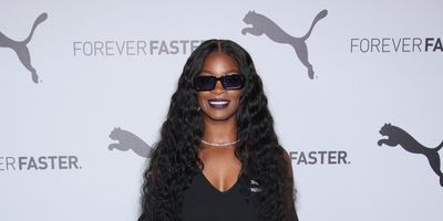 Ari Lennox during an interview, exuding confidence and reflecting on her journey through therapy and self-healing.