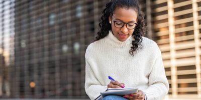 Black woman writing