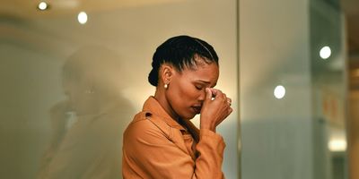 Black-woman-stressed-at-work