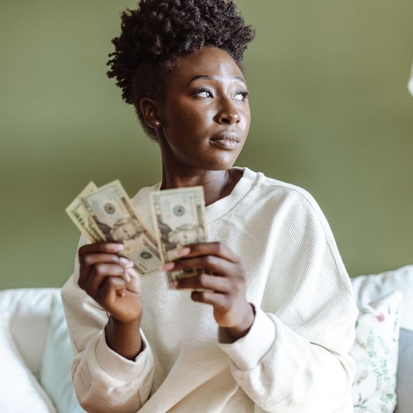 This Is What It Really Means To Heal Your Relationship With Money