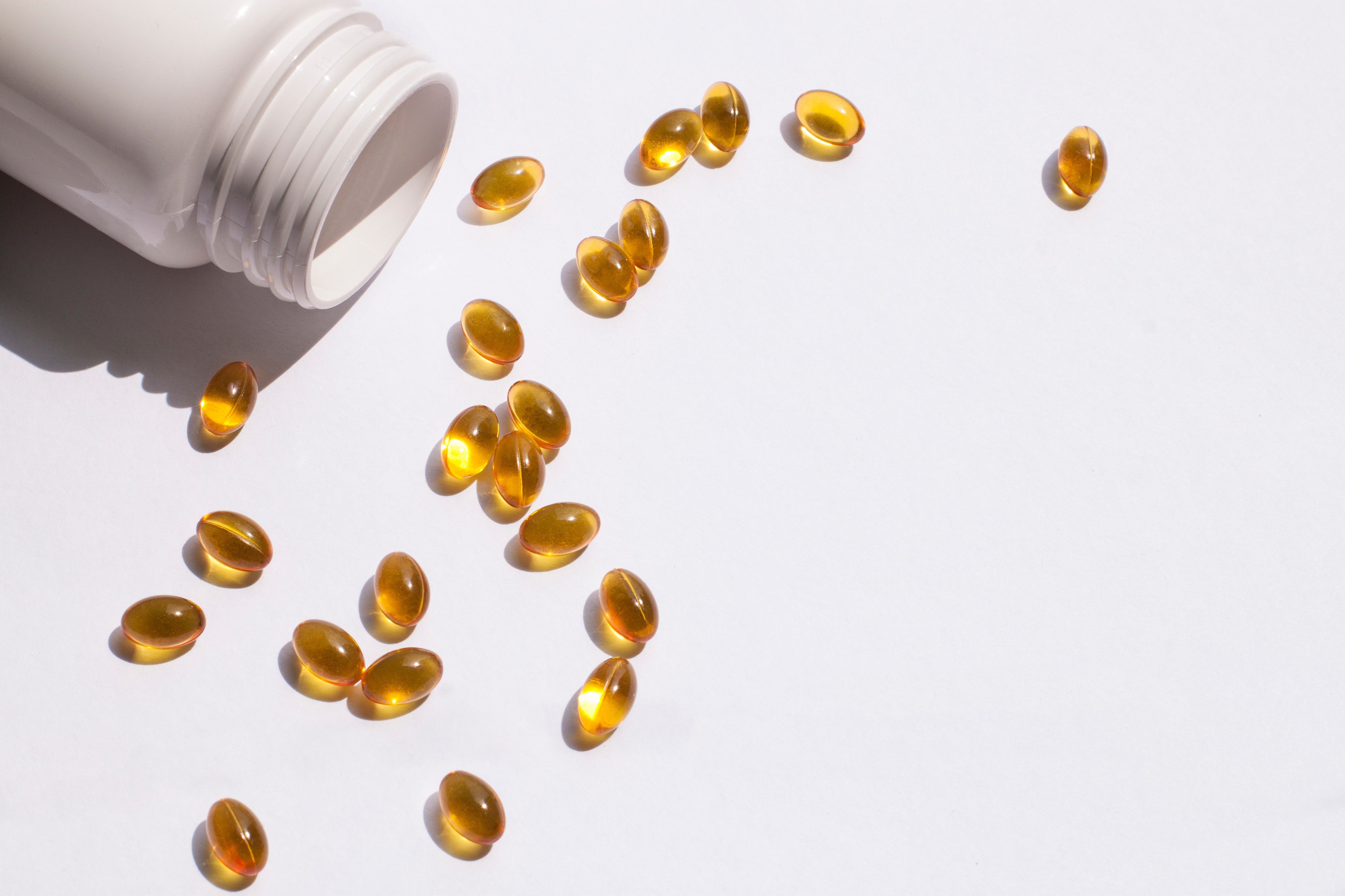vitamins in the form of tablets are in the sun on the table