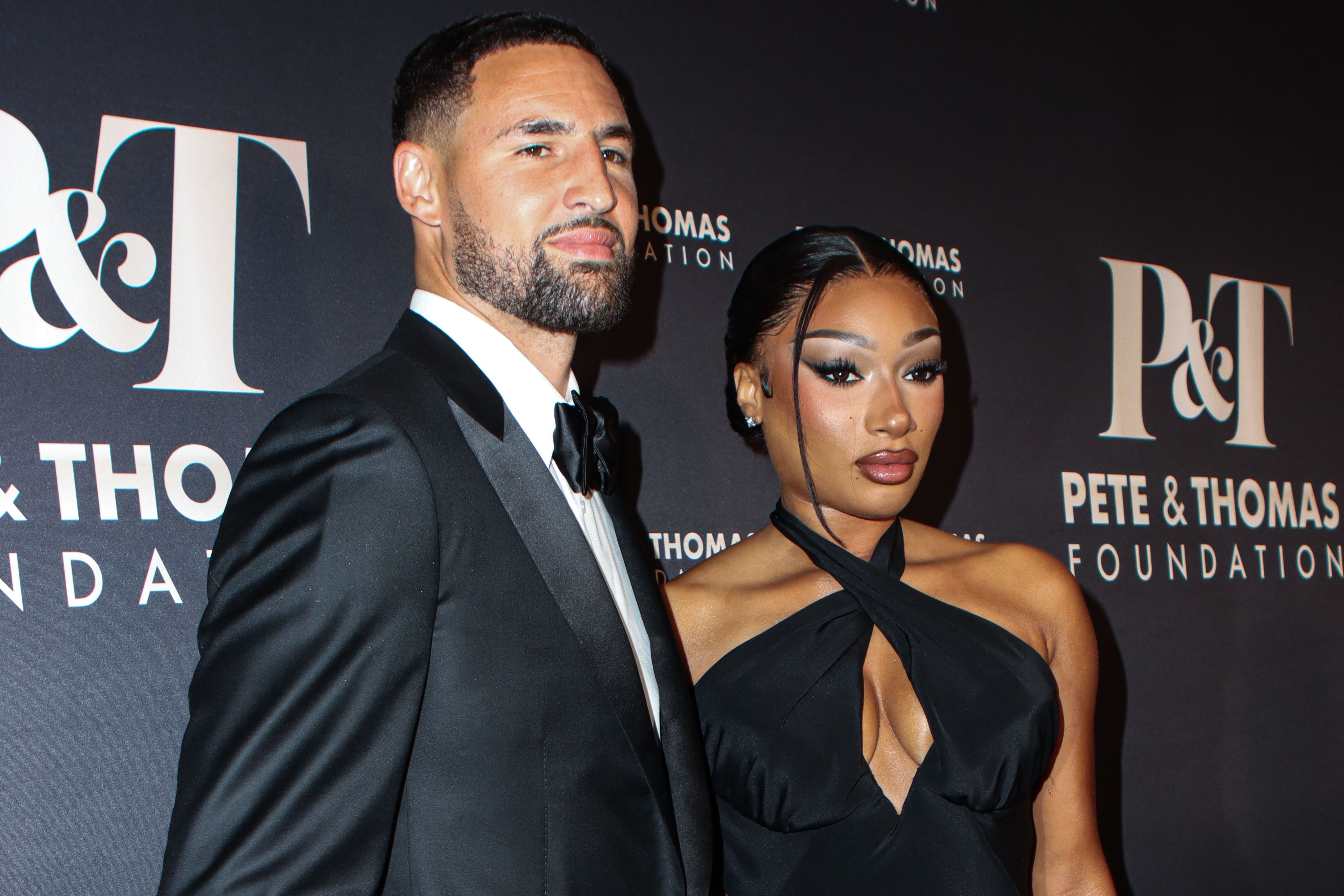 Klay Thompson and girlfriend Megan Thee Stallion (Megan Jovon Ruth Pete) wearing Off-White arrive at the Inaugural Megan Thee Stallion's Pete And Thomas Foundation Gala held at Gotham Hall at The Haier Building in Manhattan, New York City, New York, United States.