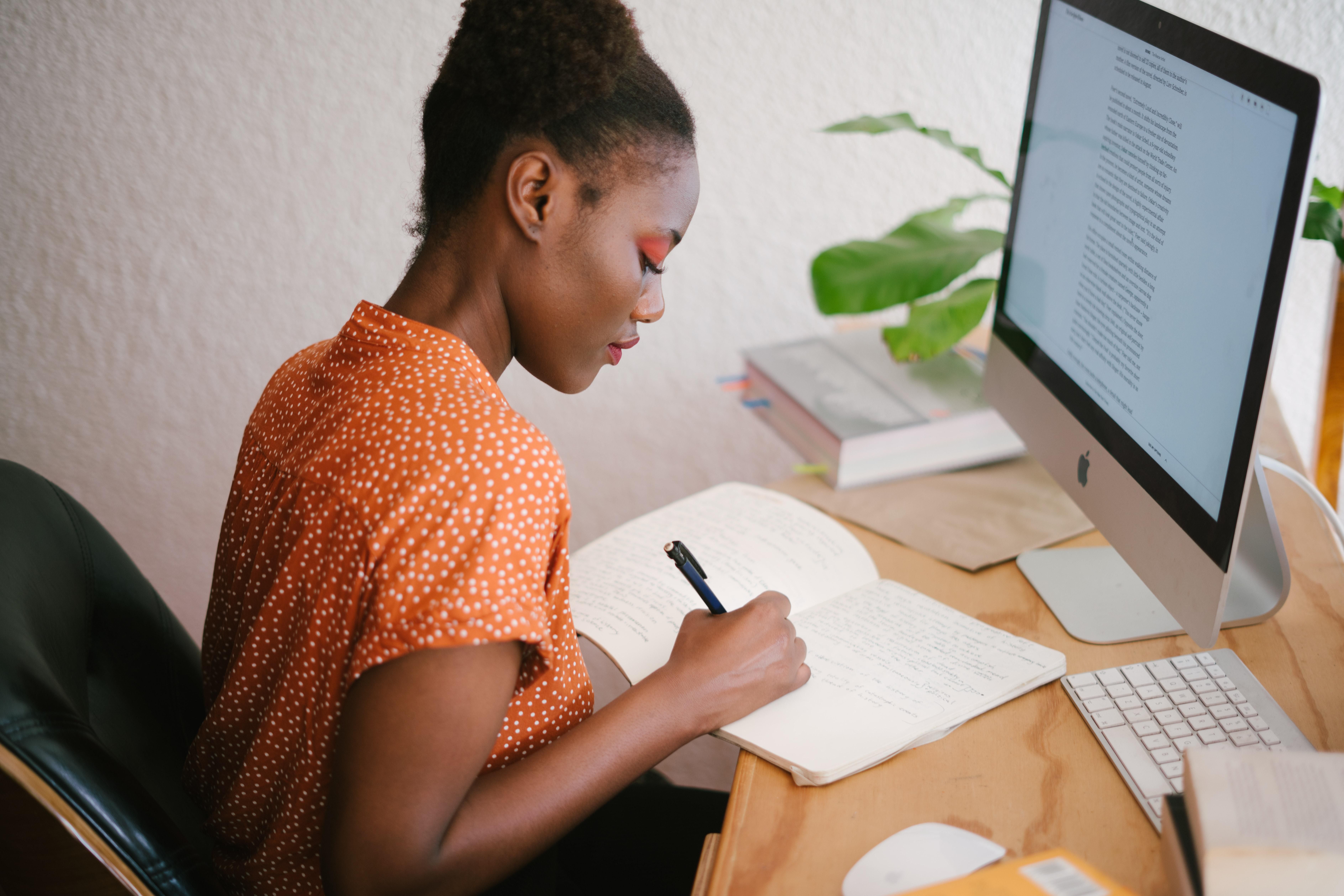 photo-of-black-woman-working