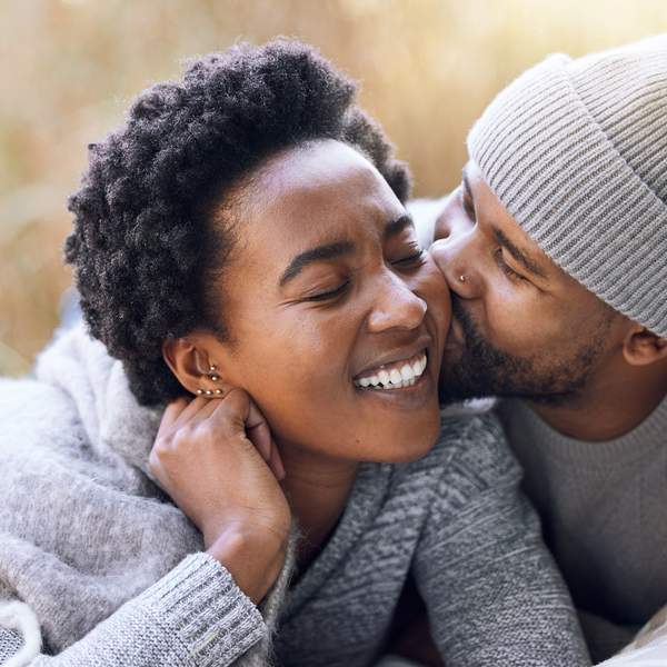 loving-Black-couple-being-affectionate-wearing-winter-clothes