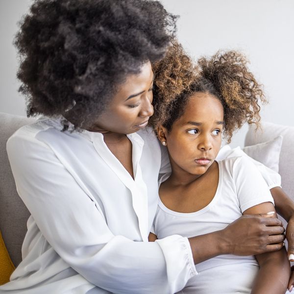 Loving-mother-gentle-parenting-style-while-consoling-upset-daughter