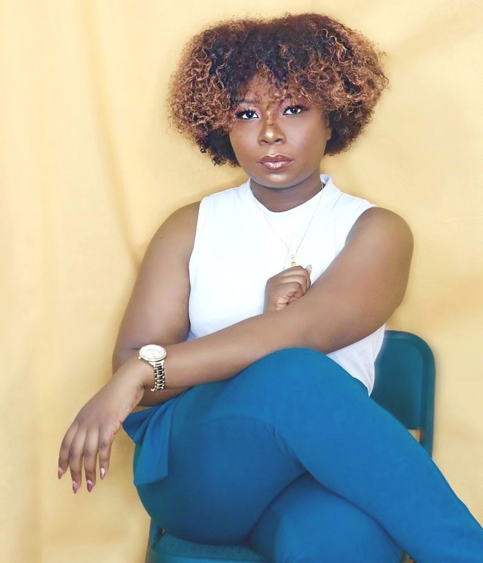 mykail-james-crossed-leg