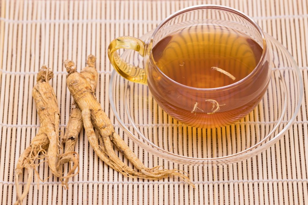 Teacup-saucer-set-ginseng-root-beside-it
