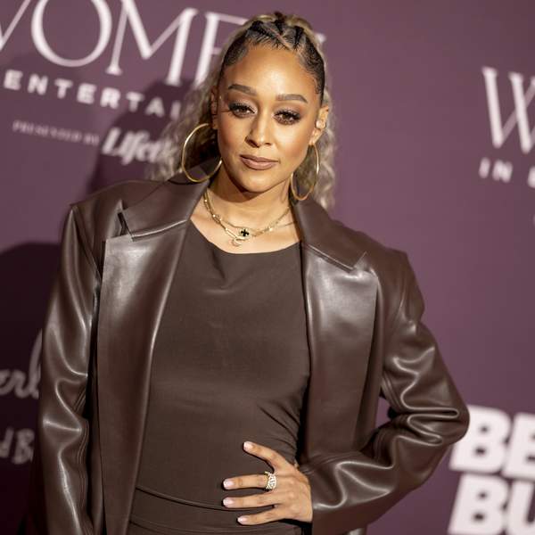 tia-mowry-attending-an-event-striking-a-power-pose-on-red-carpet