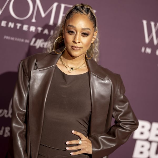 tia-mowry-attending-an-event-striking-a-power-pose-on-red-carpet