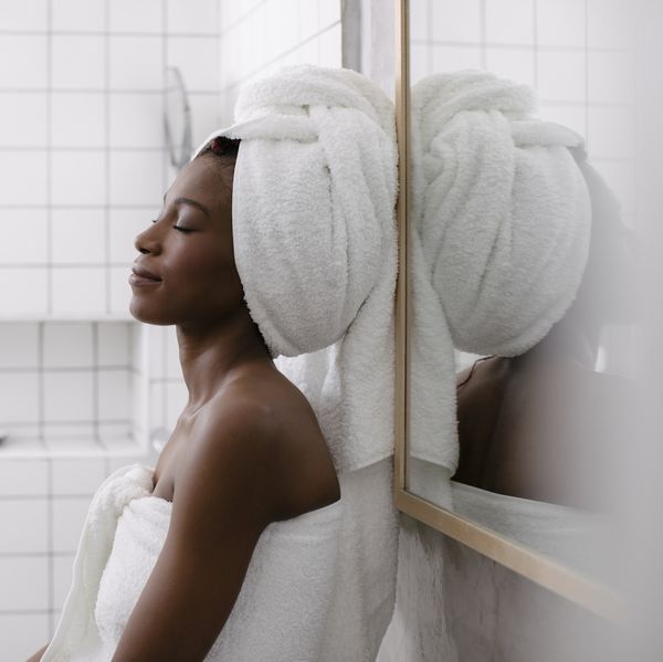 woman-relaxing-in-bath-towel-add-luxury-simple-pleasures-to-your-daily-life