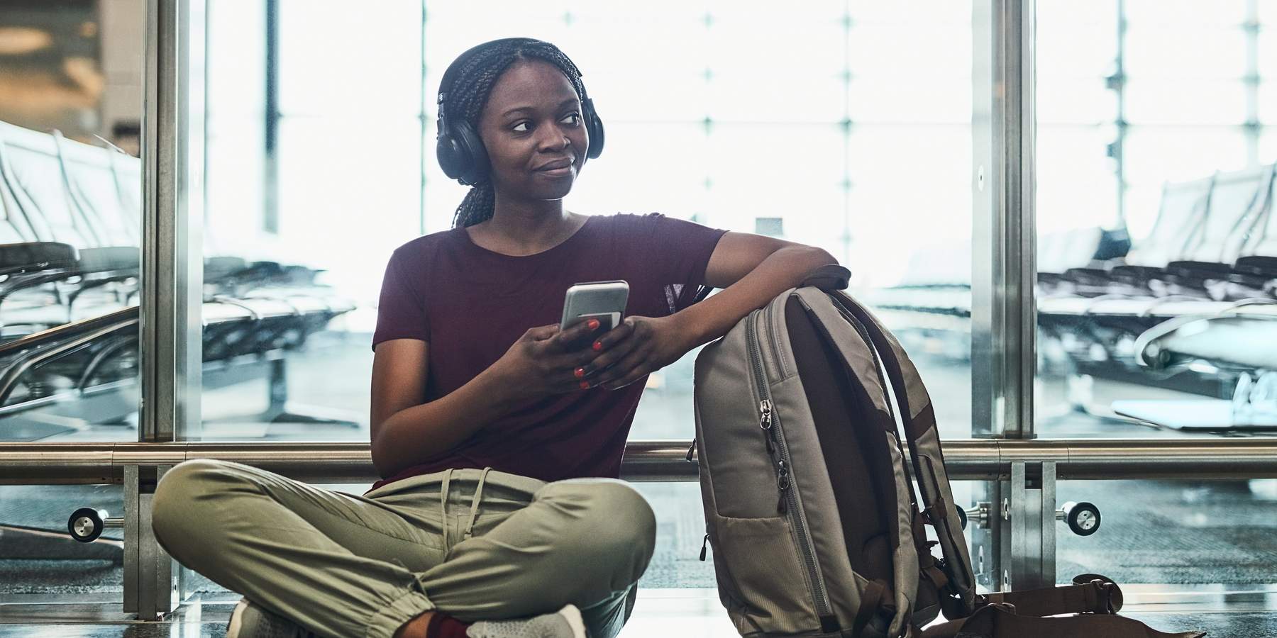 Woman stretching out during layover at airport