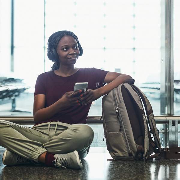 Woman stretching out during layover at airport