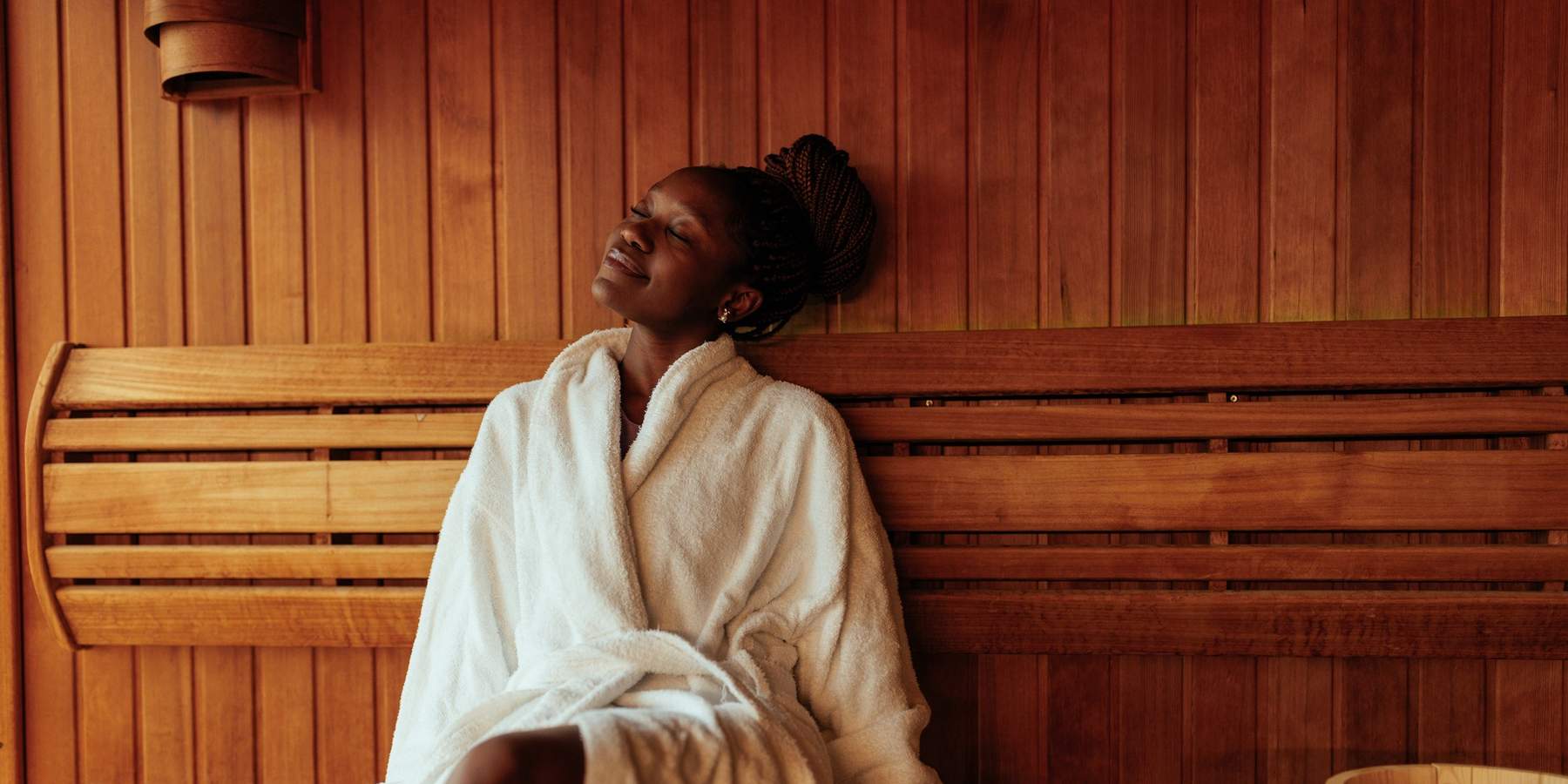 Young-black-woman-relaxing-in-steam-room